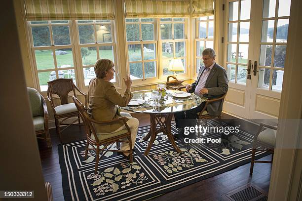 In this photo provided by the German Government Press Office , Canadian Prime Minister Stephen Harper and German Chancellor Angela Merkel talk during...