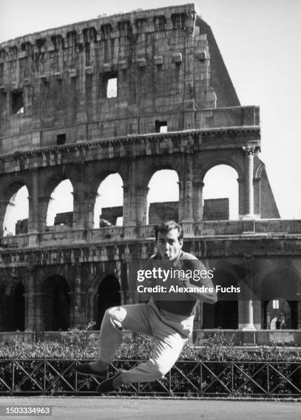 Actor Bobby Darin happily jumping while visiting Rome in 1960.