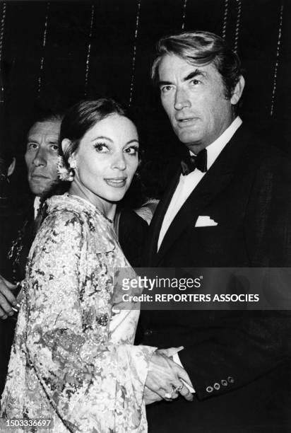 Acteur américain Gregory Peck et sa femme Véronique lors d'une soirée à Monaco le 8 aout 1969