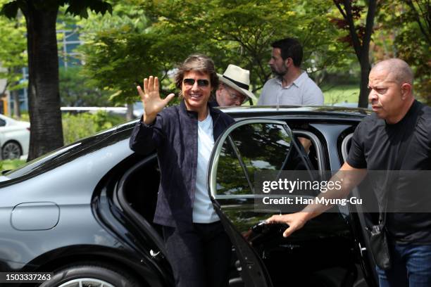 Actor Tom Cruise waves to his fans upon his arrival at Gimpo International Airport on June 28, 2023 in Seoul, South Korea. Tom Cruise is visiting...