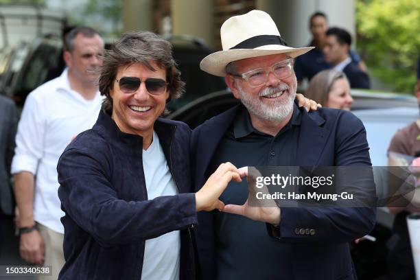 Actor Tom Cruise and director Christopher McQuarrie pose for media upon his arrival at Gimpo International Airport on June 28, 2023 in Seoul, South...