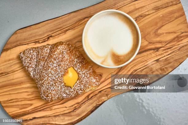 cappuccino and custard brioche - coffee italy stock pictures, royalty-free photos & images