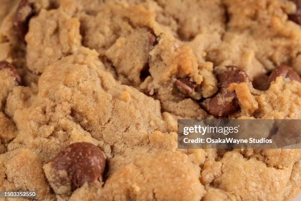 chocolate chip cookie - extreme close up stock pictures, royalty-free photos & images