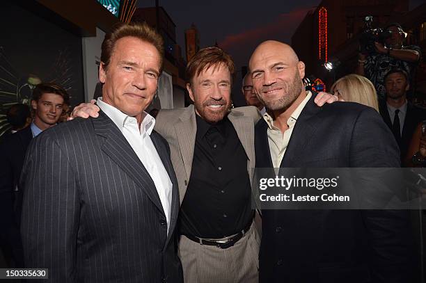 Actors Arnold Schwarzenegger, Chuck Norris and Randy Couture arrive at "The Expendables 2" Los Angeles Premiere at Grauman's Chinese Theatre on...