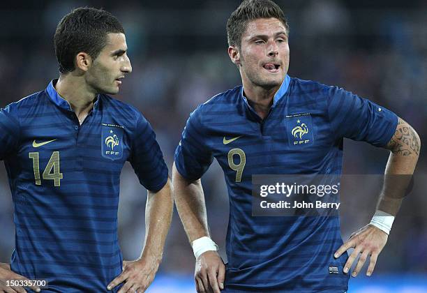 Maxime Gonalons and Olivier Giroud of France in action during the international friendly match between France and Uruguay at the Stade Oceane on...