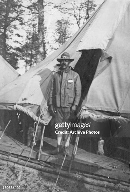 An African-American soldier of the US Army outside his tent in Saint-Dizier, Haute Marne, north-eastern France, circa 1918.