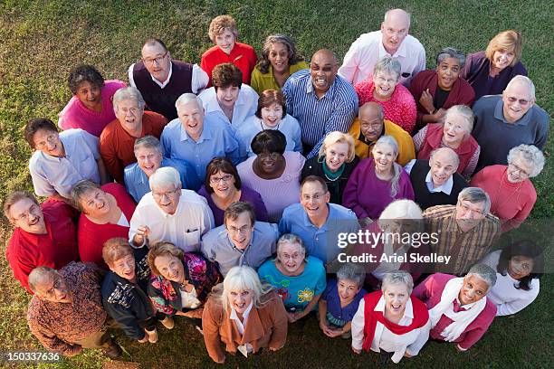 crowd of people standing together - crowd looking up stock pictures, royalty-free photos & images