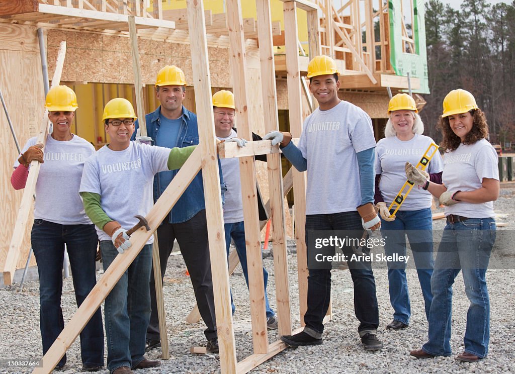Volunteers working on construction site