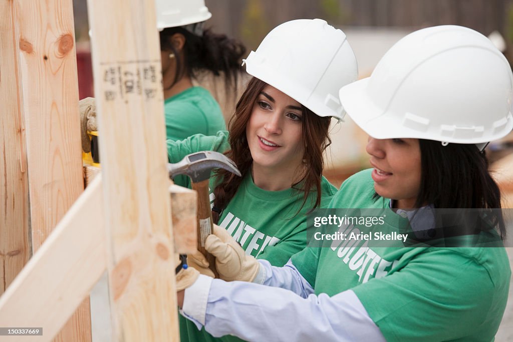 Volunteers working on construction site
