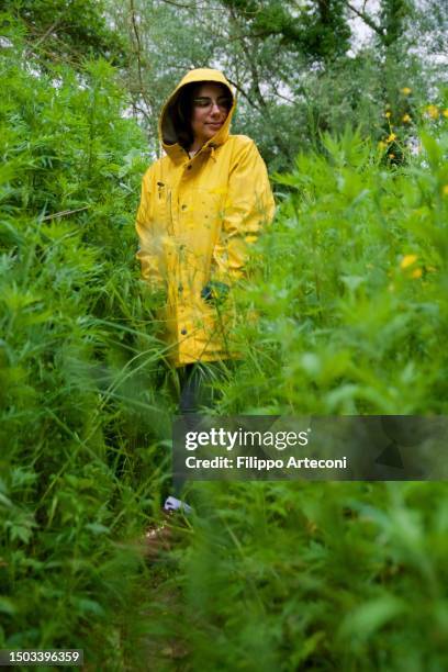 girl enjoy nature in a rainy day - girl oilskin stock pictures, royalty-free photos & images