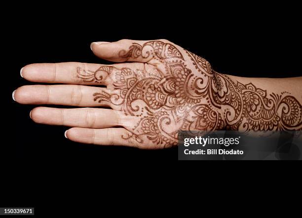 open hand with henna - henna hands stock pictures, royalty-free photos & images