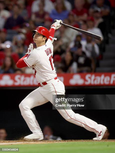 Shohei Ohtani of the Los Angeles Angels watches his opposite field solo homerun, to take a 3-1 lead over the Chicago White Sox, during the seventh...