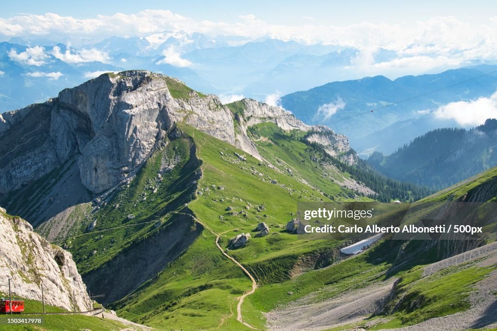 Scenic view of landscape and mountains against sky,Mount Pilatus,Alpnach,Switzerland