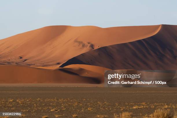 scenic view of desert against clear sky,namibia - gerhard schimpf fotografías e imágenes de stock