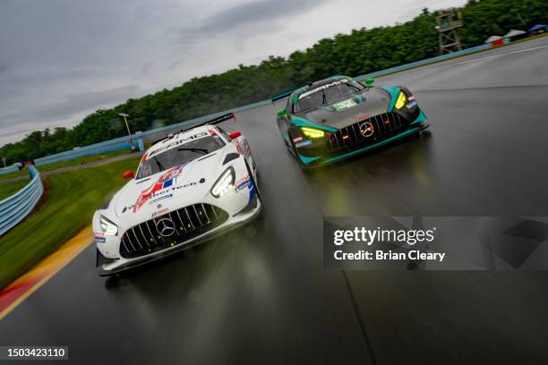 The Mercedes AMG GT3 of Jules Gouon and Daniel Juncadella and the Mercedes AMG of Mike Skeen, Kenton Koch and Mikael Grenier drives on a wet track in...