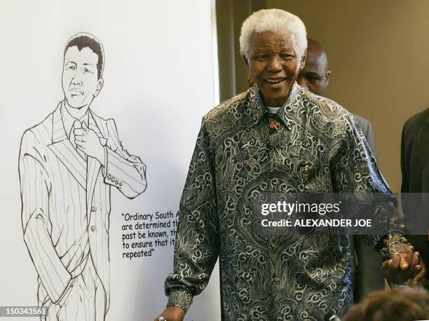 South African former President Nelson Mandela launches Izipho , an exhibition of gifts and awards from around the world received by Mandela,...