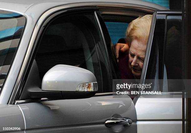 Former British Prime Minister Margaret Thatcher leaves hospital in west London on November 1, 2010. Thatcher left hospital Monday after spending...