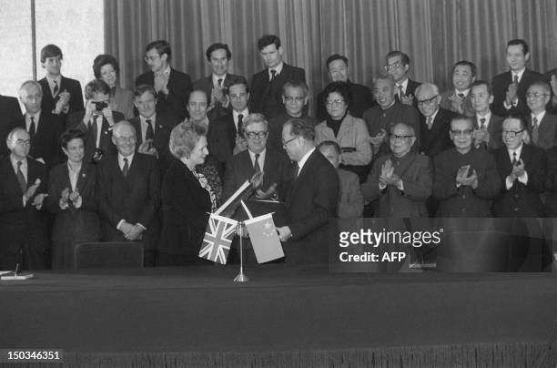 Photo dated 19 December 1984 showing Chinese Premier of the People's Republic of China Zhao Ziyang and British Prime Minister Margaret Thatcher in...