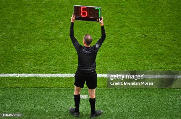 Dublin , Ireland - 1 July 2023; A sideline official holds up a board to indicate a substitution during the GAA Football All-Ireland Senior...