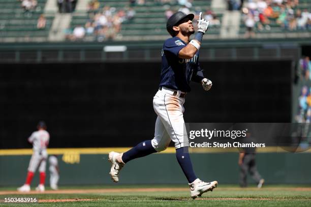 Jose Caballero of the Seattle Mariners celebrates his home run during the eighth inning against the Washington Nationals at T-Mobile Park on June 28,...