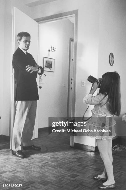 Actor Klaus Kinski and daughter Nastassja Kinski pose for a portrait in March 1966 in Rome, Italy.