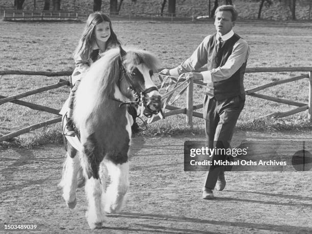 Actor Klaus Kinski and daughter Nastassja Kinski pose for a portrait in March 1966 in Rome, Italy.