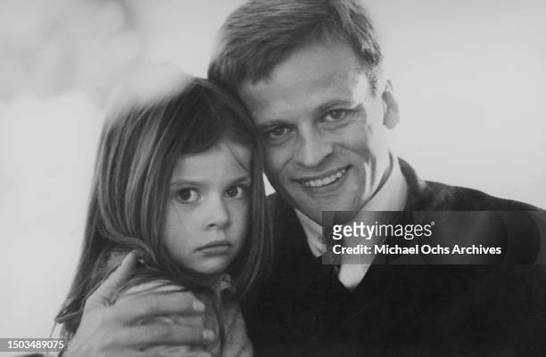Actor Klaus Kinski and daughter Nastassja Kinski pose for a portrait in March 1966 in Rome, Italy.