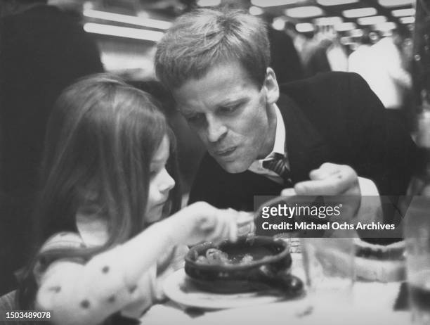 Actor Klaus Kinski and daughter Nastassja Kinski pose for a portrait in March 1966 in Rome, Italy.