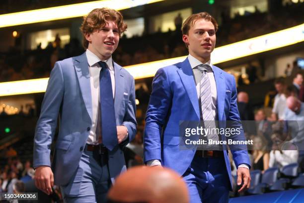 Andrew Cristall and Connor Bedard are seen prior to round one of the 2023 Upper Deck NHL Draft at Bridgestone Arena on June 28, 2023 in Nashville,...