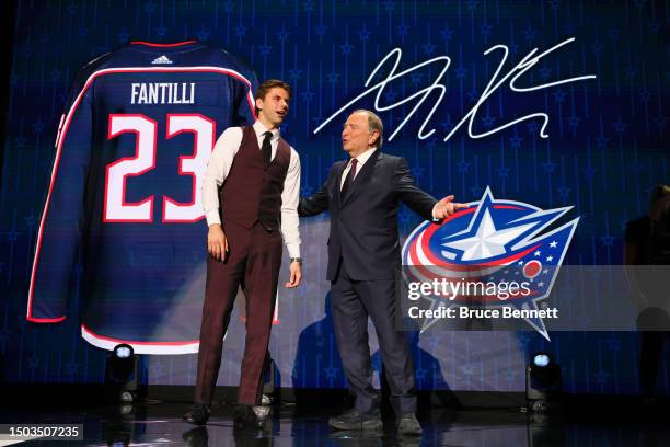 Adam Fantilli is selected by the Columbus Blue Jackets with the third overall pick during round one of the 2023 Upper Deck NHL Draft at Bridgestone...