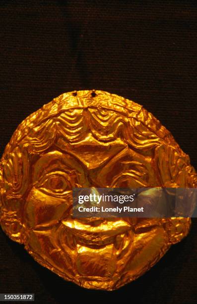 gold repousse gorgoneion at the benaki museum collection. - gorgoneion fotografías e imágenes de stock