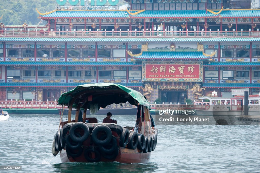 Sampan on its way to Jumbo Floating Restaurant, Aberdeen.