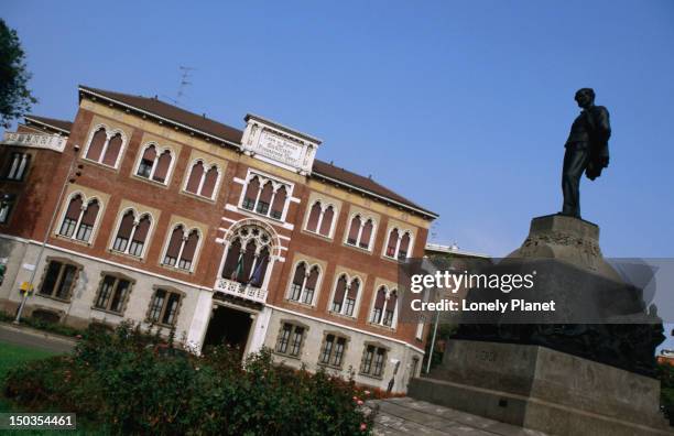 casa di riposo giuseppe verdi with statue of verdi. - casa di riposo stock pictures, royalty-free photos & images