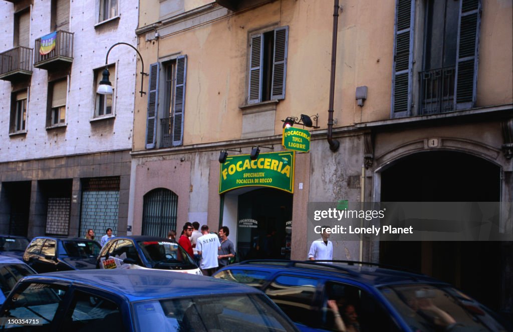La Focacceria Tipica Ligure behind traffic, Via Giovanni Giolitti.