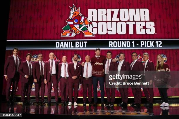 Danil But is selected by the Arizona Coyotes with the 12th overall pick during round one of the 2023 Upper Deck NHL Draft at Bridgestone Arena on...