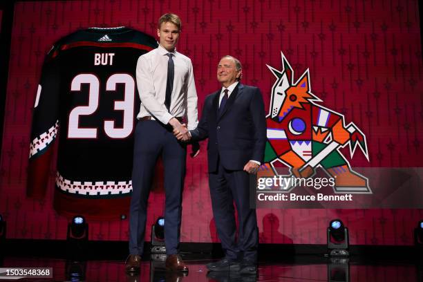 Danil But is selected by the Arizona Coyotes with the 12th overall pick during round one of the 2023 Upper Deck NHL Draft at Bridgestone Arena on...