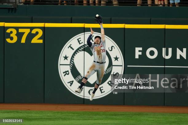 Zach McKinstry of the Detroit Tigers catches a ball hit by Jonah Heim of the Texas Rangers in the first inning at Globe Life Field on June 28, 2023...