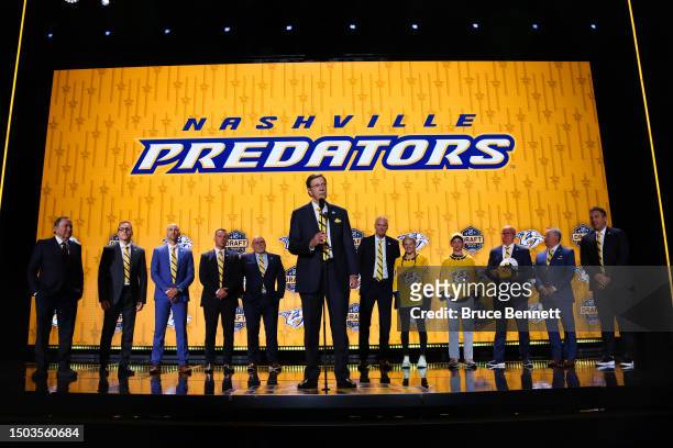 General manager David Poile of the Nashville Predators is seen on stage during round one of the 2023 Upper Deck NHL Draft at Bridgestone Arena on...