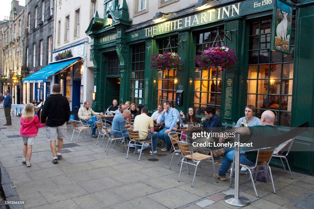 Customers outside White Hart Inn, Grassmarket.