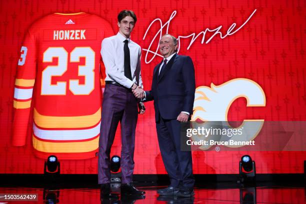 Samuel Honzek is selected by the Calgary Flames with the 16th overall pick during round one of the 2023 Upper Deck NHL Draft at Bridgestone Arena on...