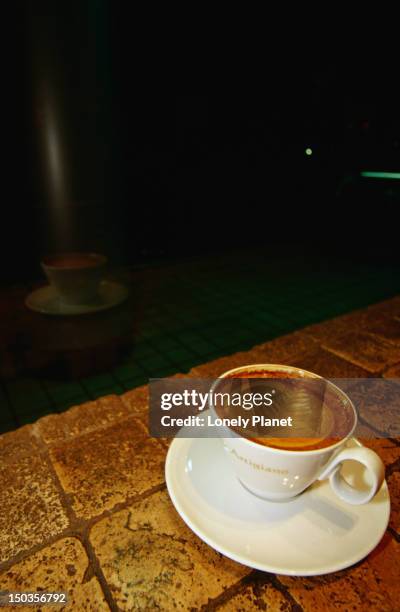 cup of coffee at cafe artigiano. - artigiano stock-fotos und bilder