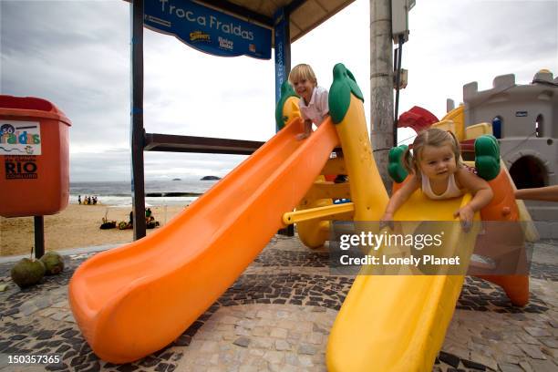 baixo bebe playstation on the beach for toddlers in leblon. - baixo bebe stock pictures, royalty-free photos & images