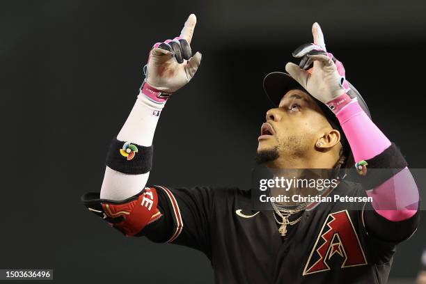 Ketel Marte of the Arizona Diamondbacks reacts after hitting a RBI single against the Tampa Bay Rays during the third inning of the MLB game at Chase...