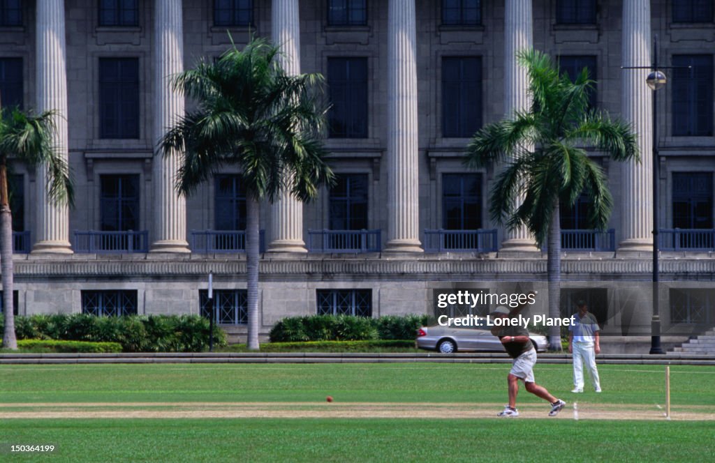 Cricket game in front of City Hall.