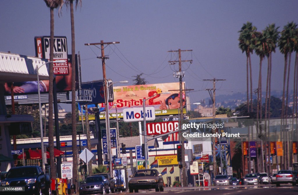 Signs and billboards along Sunset Boulevard.