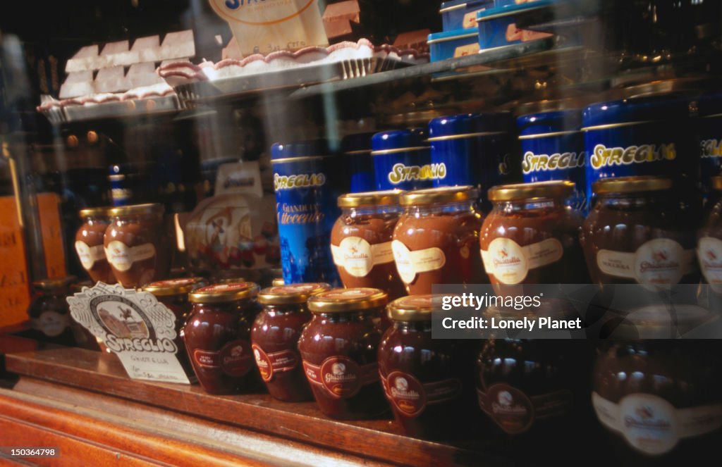 Local chocolate spread on display in shop window.
