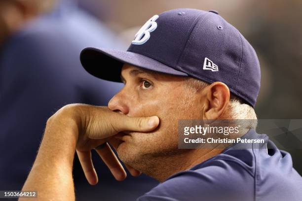 Manager Kevin Cash of the Tampa Bay Rays looks on from the dugout during the sixth inning of the MLB game against the Tampa Bay Rays at Chase Field...