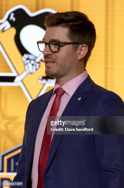 President of Hockey Operations Kyle Dubas of the Pittsburgh Penguins walks onstage during the 2023 Upper Deck NHL Draft - Round One at Bridgestone...