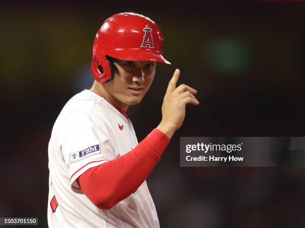 Shohei Ohtani of the Los Angeles Angels reacts to his line drive single during the eighth inning against the Chicago White Sox at Angel Stadium of...