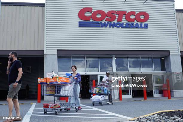 Customers exit a Costco store on June 28, 2023 in Teterboro, New Jersey. Costco is cracking down on membership card sharing at its stores.